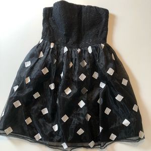 Black strapless dress with embroidered tulle skirt